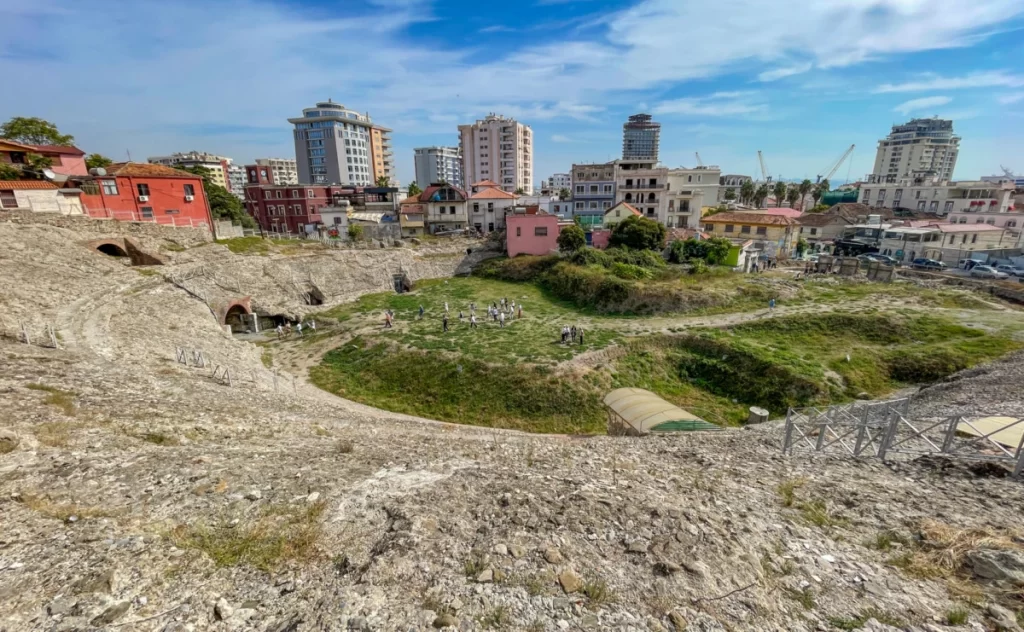 The Roman amphitheater of Durrës with clear blue skies above