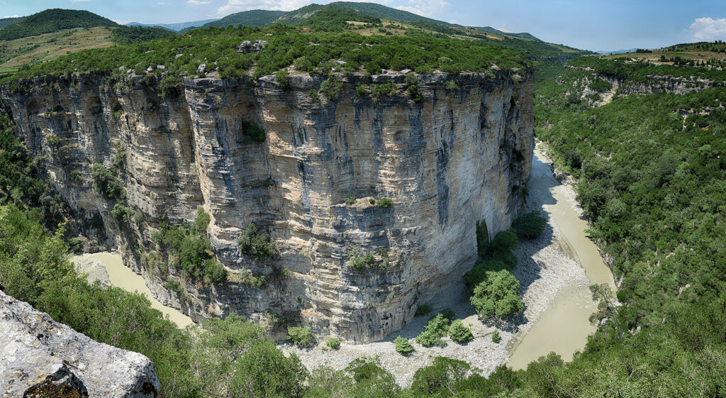 Tourists rafting through the narrow river passages of Osumi Canyon in southern Albania